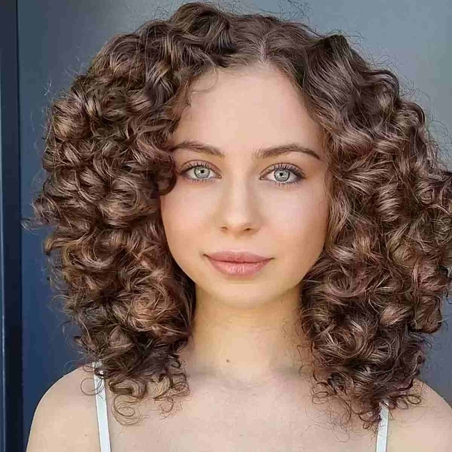 mid-length-thick-curly-hair-with-an-off-center-part.jpg