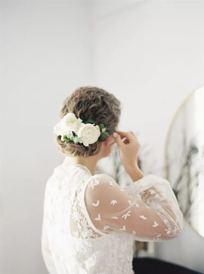 تسريحة A Low Curly Chignon