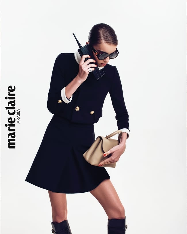 سترة وسروال قصير وحقيبة ونظّارات من Celine by Hedi Slimane خاتم من Burma
