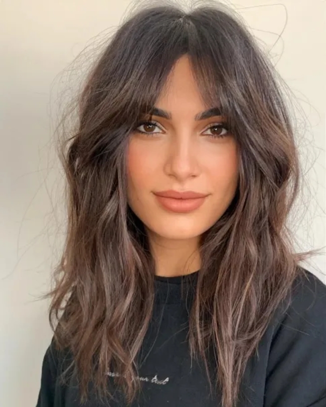 تسريحة Shaggy Layers and Long Bangs